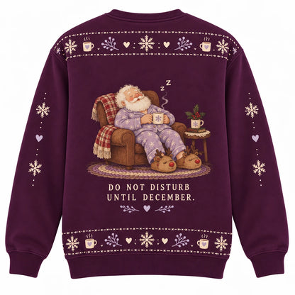 All Gifts Delivered Ugly Christmas Sweater - Christmas Jumper (back): Santa in pajamas on sofa with reindeer slippers and cocoa