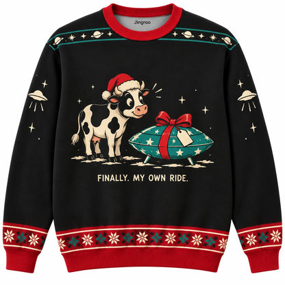 Finally My Own Ride Ugly Christmas Sweater - Christmas Jumper (front): cow in Santa hat looks at UFO-shaped wrapped gift
